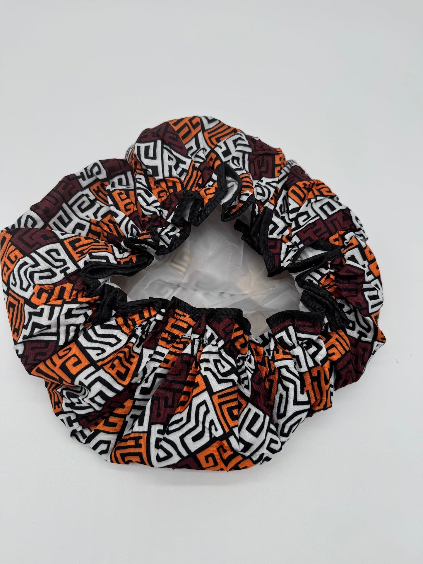 Große Duschhaube, Brown bogolan